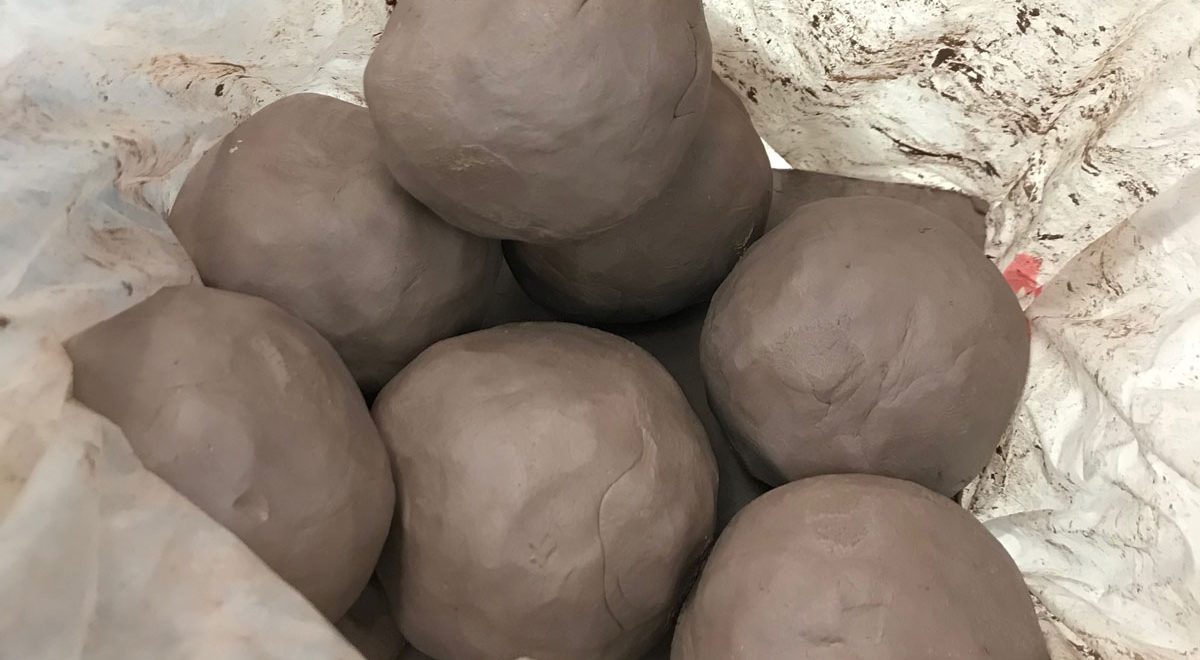 balls of clay in a plastic bag